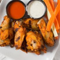 Chicken Wings · Eight wings, grilled or fried and garnished with celery and carrots. Served with ranch or bl...