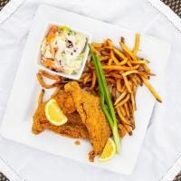Fried Catfish · Three catfish filets coated with corn-meal, with sides of fries, coleslaw, and a side of tar...