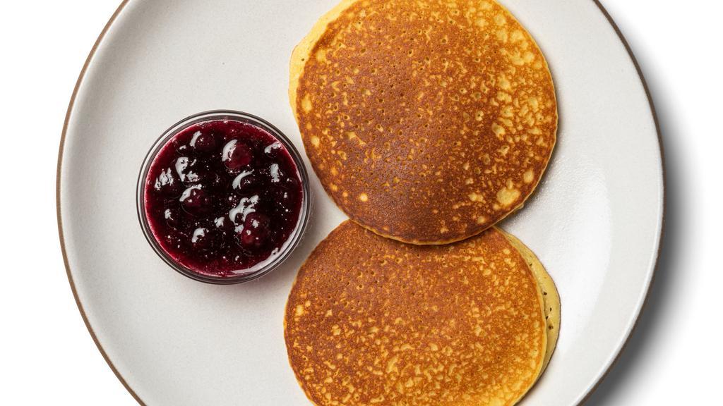 Almond Butter Pancakes · Gluten free oats, almond butter, egg, maple, and more for a short stack that only feels indulgent. Served with a berry compote.