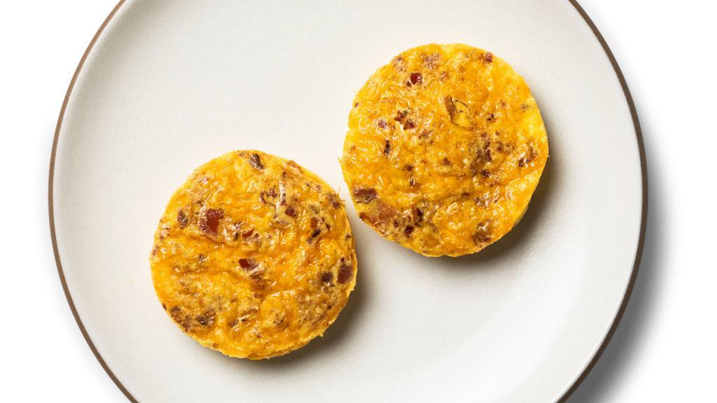 Bacon And Cheddar Egg Bites · You can’t get more classic than bacon, egg, and cheese when it comes to breakfast. We took the classic and made it super convenient for you.