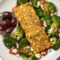 Herb Crusted Salmon With Roasted Broccoli & Feta · This herby Mediterranean dish features salmon marinated in a lemon & olive oil sauce, then t...