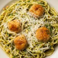 Pesto Pasta With Chicken Sausage Meatballs · Pasta night got an upgrade with this meal! Our favorite gluten-free pasta is coated in a rus...