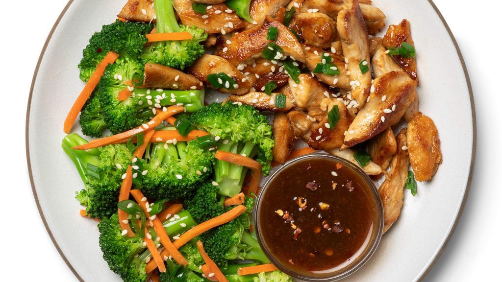 Stir-Fry Chicken And Broccoli With Garlic Sauce · Garlic lovers, unite! Our Snap take on Stir-Fry Chicken includes pan-seared chicken topped with sesame seeds, served over a bed of carrots and broccoli, all topped with a soy-free garlic sauce.