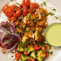 Shawarma Chicken Bowl With Lemon-Tahini Sauce · Some say variety is the spice of life, and variety is what you get in this Shawarma Chicken ...