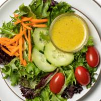 Side House Salad With Lemon Vinaigrette · If you’re looking to add a few more veggies to your meals, look no further. This simple side...
