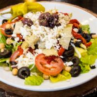 Greek Salad · Romaine Lettuce, Tomatoes, Chickpeas, Sweet Peppers, Artichokes, Pepperoncini, Feta Cheese &...