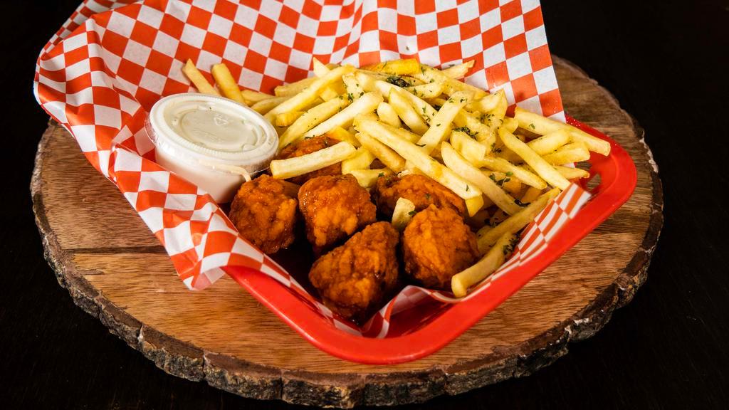 Chicken Bites · Breaded boneless chunks of whole chicken breast try them with your favorite sauce served with french fries and blue cheese.