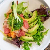 Hawaiian Poke Salad · Chopped salmon, tuna, yellowtail, and avocado lightly dressed with a chef’s special sauce, m...