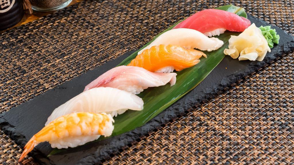 Sushi Appetizer · (6) Pieces of assorted raw fish (chef’s choice) served unrolled over rice.
We use soft-boiled eggs. Consuming raw fish, seafood, shellfish or undercooked eggs may increase your risk of foodborne illness.