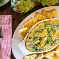 Spinach & Artichoke Dip · (1,570 cal). A blend of fresh spinach, artichoke hearts, and roasted garlic, swirled in crea...