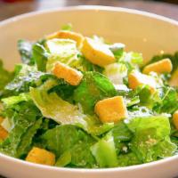 Side Caesar Salad · house blend lettuce, parmesan & crostini with classic dressing.