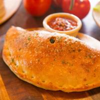 Stromboli Calzone · (1,250 cal). Pepperoni, Italian sausage, fresh mushrooms, black olives, bell peppers, Wiscon...