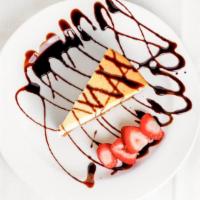 Vanilla Cheesecake · Rich creamy cheesecake with a hint of vanilla topped with your favorite drizzle raspberry or...