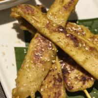 Chicken Satay (5) · Curry marinated chicken skewered and grilled to perfection. Served with a traditional Thai p...