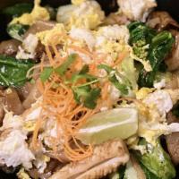 Pad See Eew · Asian broccoli, bok choy, egg, and Thai seasonings stir fried with big flat noodles with you...