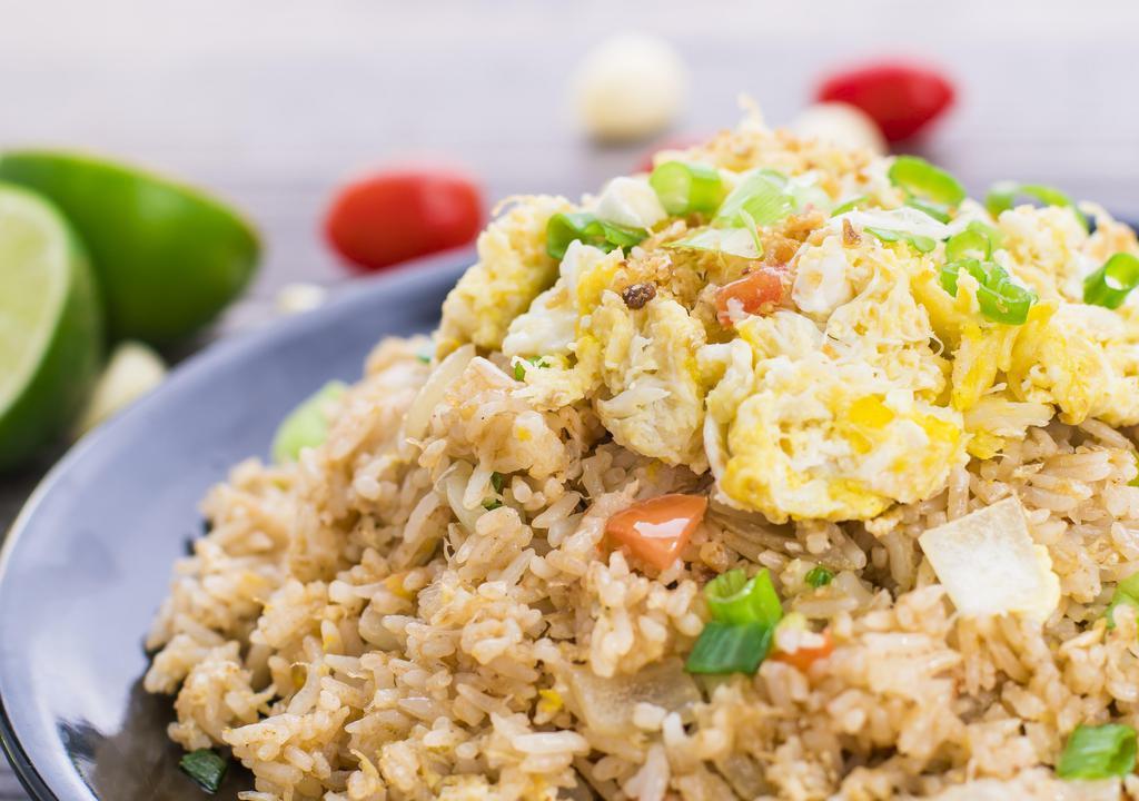 Thai Fried Rice · Stir fried rice with onions, tomatoes, and egg (choice of chicken,beef, or tofu)