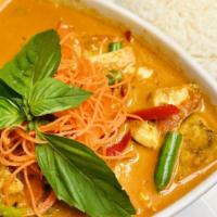 Red Curry · Homemade red curry with carrots, basil, green beans, bell peppers,
eggplants, fresh basil, b...