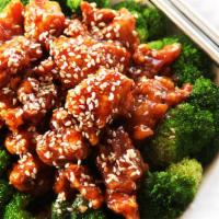 Sesame Chicken · Lightly battered chicken in a sweet and tangy sesame sauce served with fresh steamed broccoli