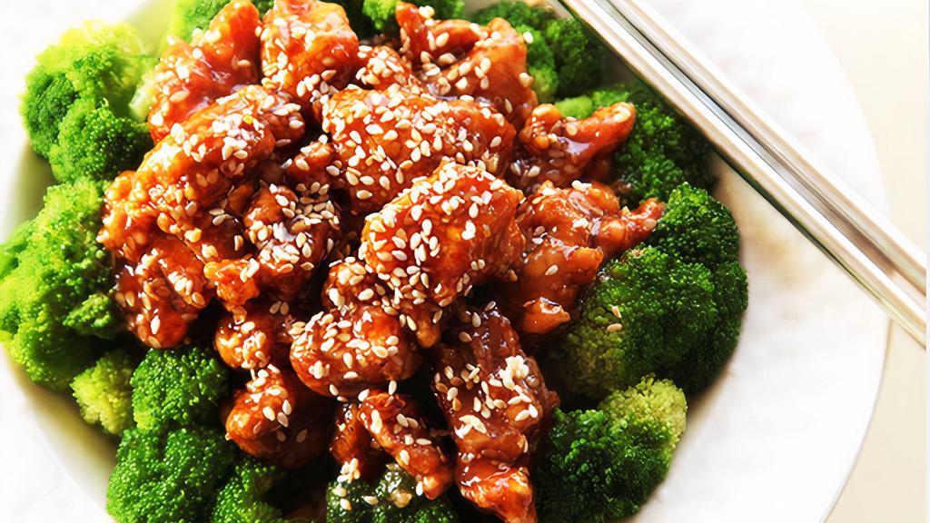 Sesame Chicken · Lightly battered chicken in a sweet and tangy sesame sauce served with fresh steamed broccoli