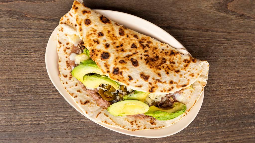 Sinhoe Taco · NEW! (Beef or Chicken Fajita with Beans, White Cheese, Jalapeños & Avocado Slices - on Soft or Toasted Tortilla)
