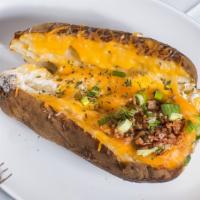 Stuffed Baked Potato · Bacon bits, butter, sour cream, cheese, and chives.