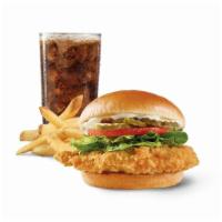 Classic Chicken Sandwich Combo · A juicy, lightly breaded crispy chicken breast with crunchy lettuce, tomato, mayo, and the p...