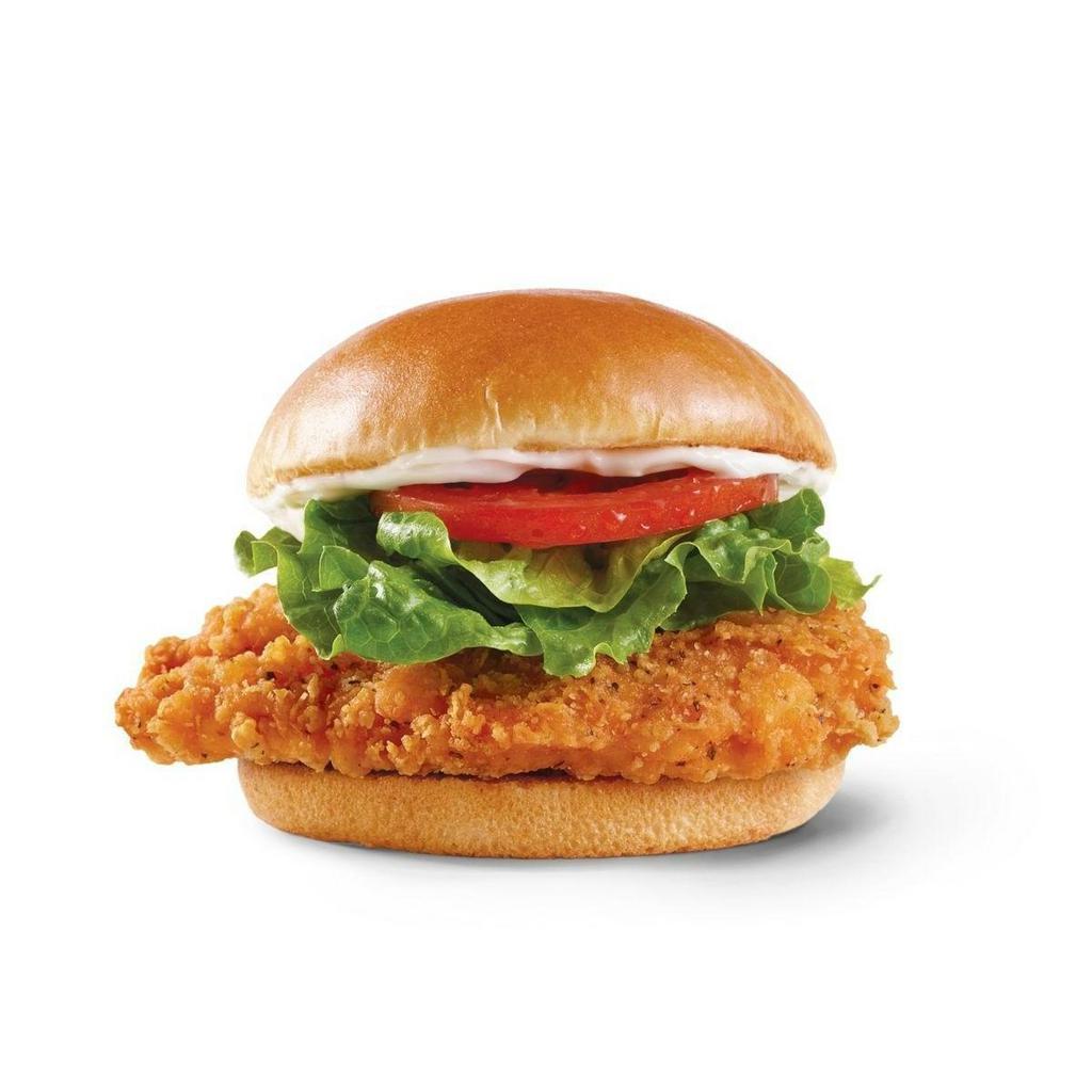 Spicy Chicken Sandwich · A juicy chicken breast marinated and breaded in our unique, fiery blend of peppers and spices to deliver more flavor inside and out, cooled down with crisp lettuce, tomato, and mayo. Its the original spicy chicken sandwich, and the one you crave