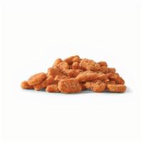 50 Pc. Spicy Chicken Nuggets · 100% white-meat chicken breaded and marinated in our unique, fiery blend of peppers and spic...