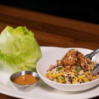 Sesame Chicken Lettuce Wraps · Sweet and spicy slaw, peanuts, noodles.
