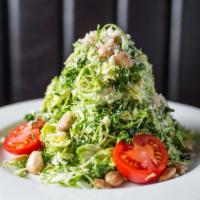 Shredded Brussels Sprouts Salad · house shredded brussels with a bit of kale & marcona almonds with basil vinaigrette & parmig...