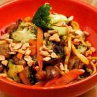 Tofu Wok Out Bowl · Served with market veggies and chopped cashews.