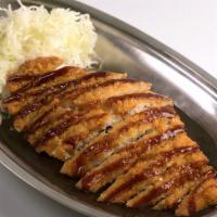 Fish Katsu Curry · Breaded fried Flounder cutlet, drizzled with tonkatsu sauce, served with shredded cabbage an...
