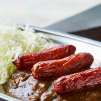 Sausage Curry · 3 premium Kurobuta pork sausages with Japanese curry and shredded cabbage over rice.
