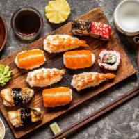 Nigiri & Maki Deluxe · 8 pieces of nigiri, salmon maki, crab mix maki, spicy tuna maki.