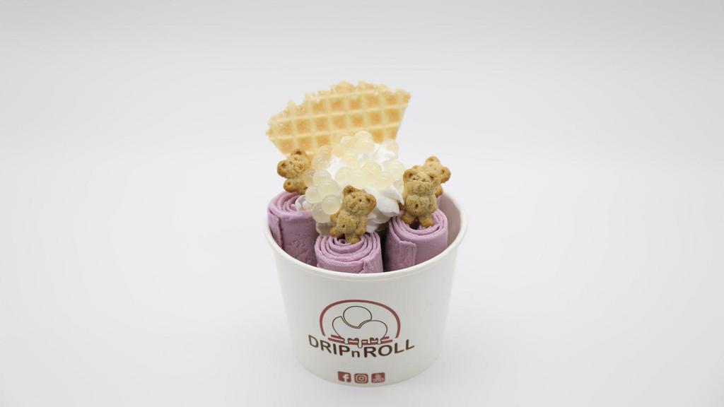 Taro-Taro · Taro ice cream, topped with whipped cream, waffle piece, graham bears, and lychee popping boba