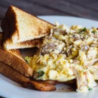 Scrambles · Choice of pulled pork, bacon, or sausage and cheese with scrambled eggs and cheddar cheese o...