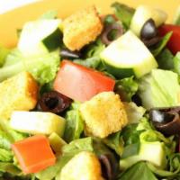 Dinner Salad · With Roma tomatoes, cucumber, black olives and croutons.