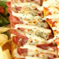 Hot Italian Sub · Pepperoni, salami, ham, Mozzarella, lettuce, and tomatoes.