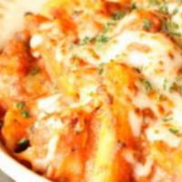 Pasta Arrabiata · Penne pasta, spicy tomato cream sauce, Italian sausage, roasted chicken, mushrooms, onions, ...