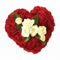 A Devoted Heart Casket Insert · Such a simple tribute, this lovely casket bouquet of white roses enclosed in a heart of red ...