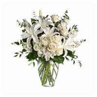 Dreams From The Heart Bouquet · A lovely bouquet to soothe and comfort, a variety of white and peach blossoms sends your hop...