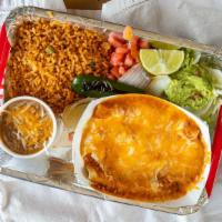Enchilada · 3 meat or cheese enchiladas rolled in corn tortilla covered in Tacolicious sauce, sour cream...