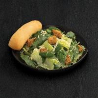 Caesar Salad · Romaine, Parmesan-Romano, Caesar dressing, Asiago croutons and Parmesan crisps Served with a...