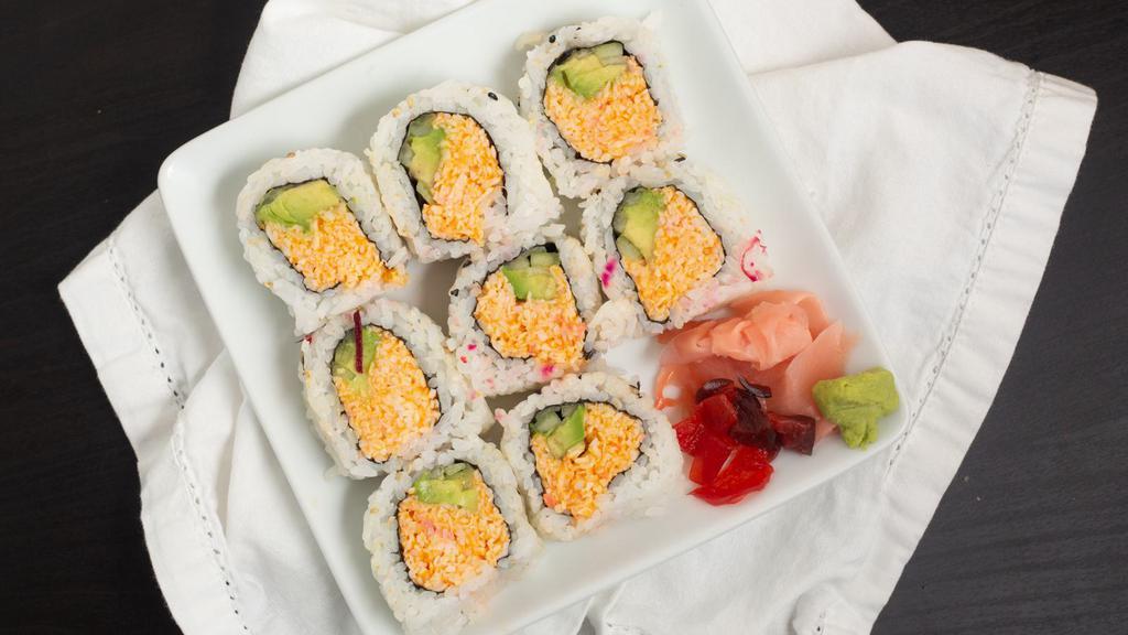 Spicy California Roll · Crab meat, avocado, and cucumber inside.