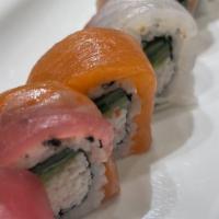 Rainbow · California roll topped with ahi tuna, salmon, sea bream, albacore, shrimp, and avocado, serv...