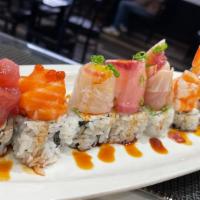 Akari · California roll topped with ahi tuna, salmon, Japanese Sea Bream, albacore, shrimp, yellowta...