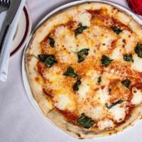 Margherita Pizza · Tomato sauce, basil, buffalo mozzarella cheese.