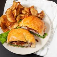 Club Sandwich & Fries · Oven roasted turkey, virginia ham, crisp smoked bacon and gruyere cheese.