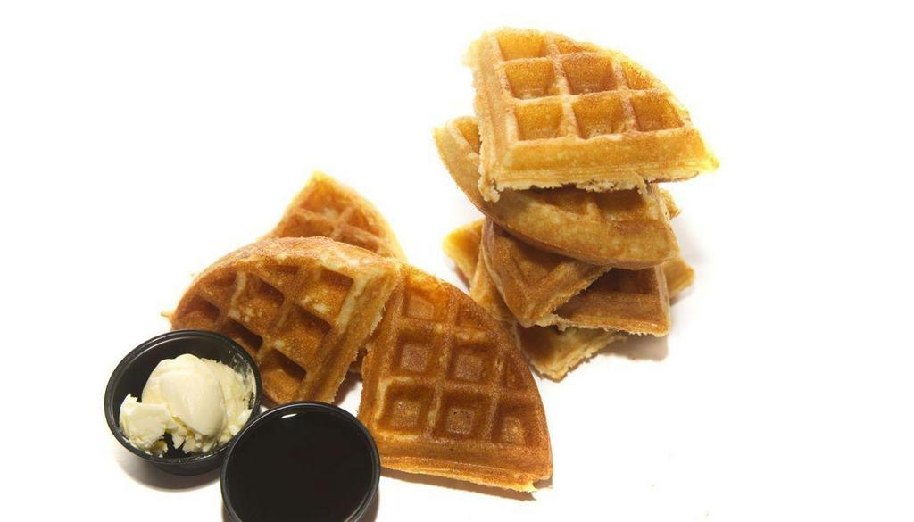 Waffle · Fresh made Waffle served with butter and maple syrup.