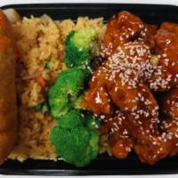 Sesame Chicken 芝麻鸡 · Chunks of fried boneless chicken, or beef with broccoli favored brown sauce.